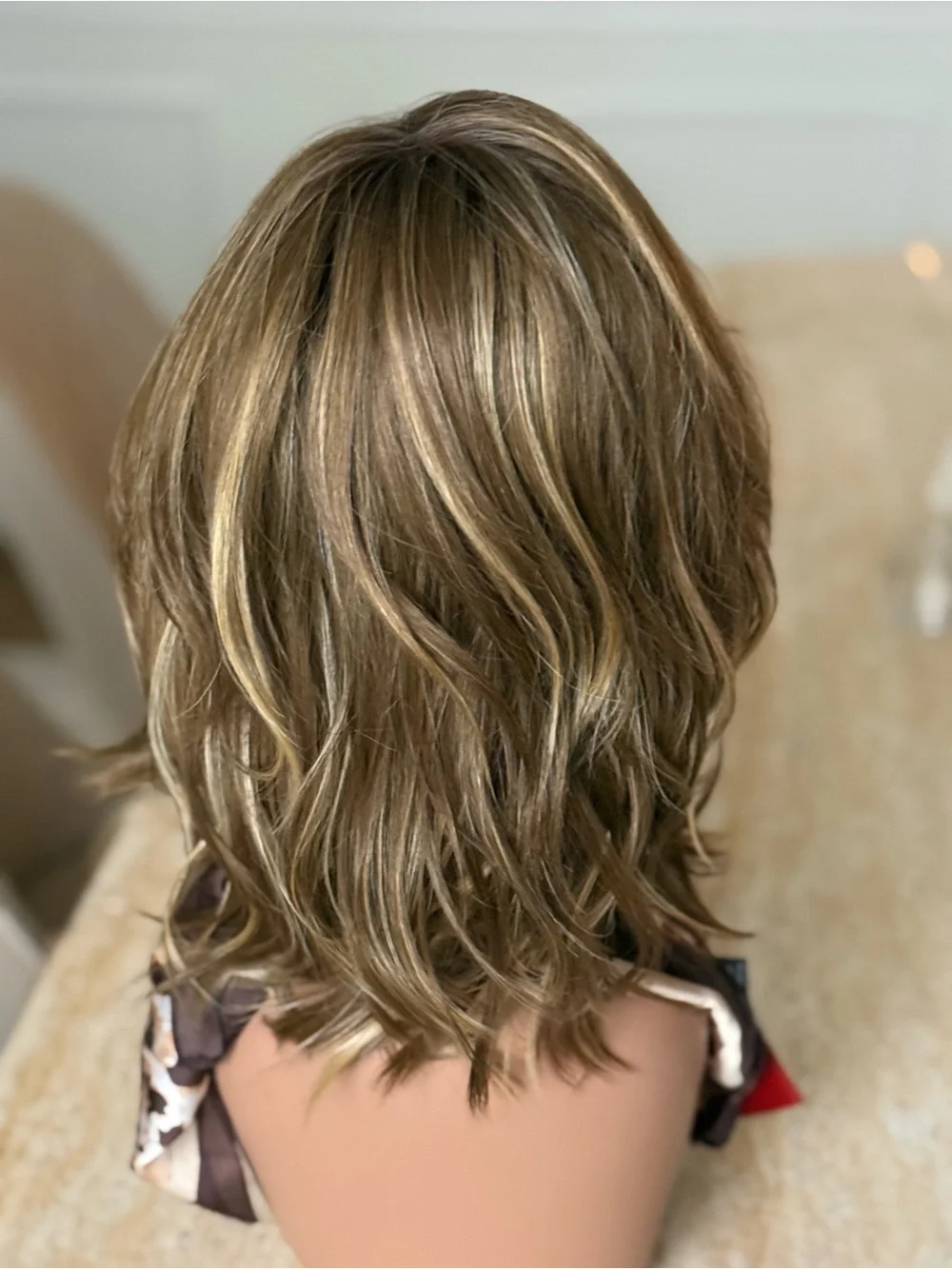 Rene of Paris Loryn Layered Women’s Wig in Mochaccino-R